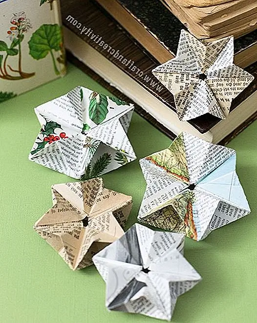 Еще один дизайн для орнаментов из бумажной звезды можно найти на Craftandcreativity. Они немного сложнее и немного сложнее, хотя весь проект, в конце концов, довольно прост. Вы можете сделать их из страниц из старой книги или цветной бумаги.