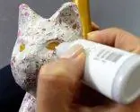 Шаг 5 - Кошка свисает с украшений