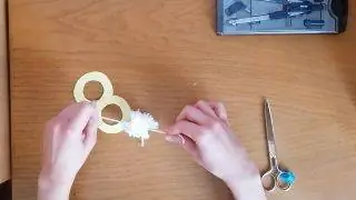 Как сделать шерстяной помпон - Шаг 9 Как сделать шерстяной помпон - Шаг 9