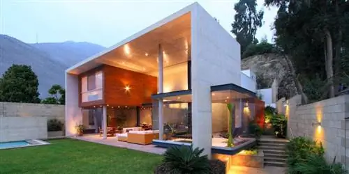 Подвесные комнаты внутри бетонного каркаса - дом от Domenack Architects