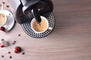Кофемашина Expresso на деревянном столе сверху