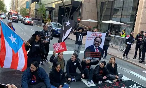 Семеро арестованы во время акции протеста во время публичного открытия MoMA
