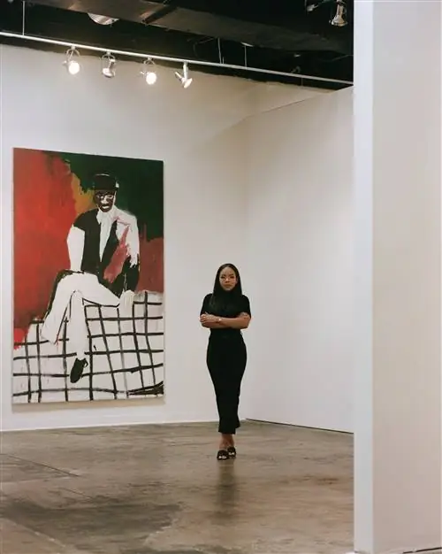 Основатель и директор Atlanta Art Week Кендра Уокер перед картиной Патрика Юджина «Все еще без названия». Основатель и директор Atlanta Art Week Кендра Уокер перед картиной Патрика Юджина «Все еще без названия».